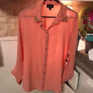 coral button down blouse with gold embellishments